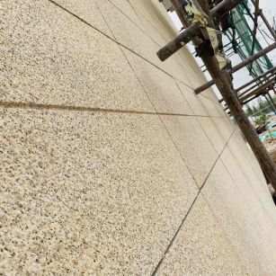 潍坊 黄金麻花岗岩荔枝面外墙干挂石材效果示例