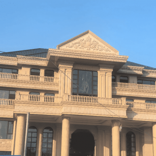 潍坊黄金麻别墅外墙干挂石材效果示例