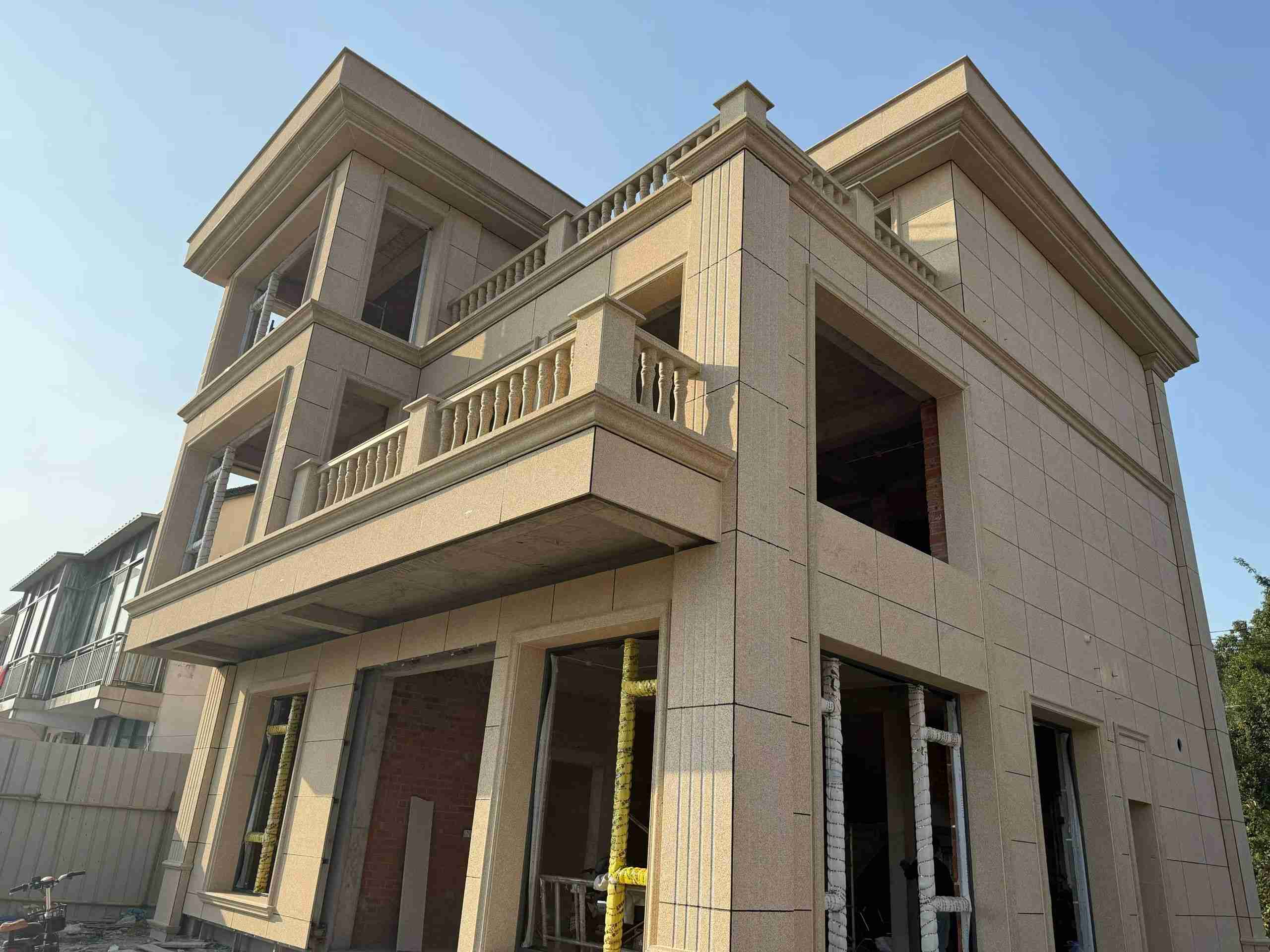 潍坊 黄金麻花岗岩石材荔枝面外墙干挂效果展示